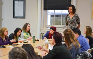 Scholarship winners around a table
